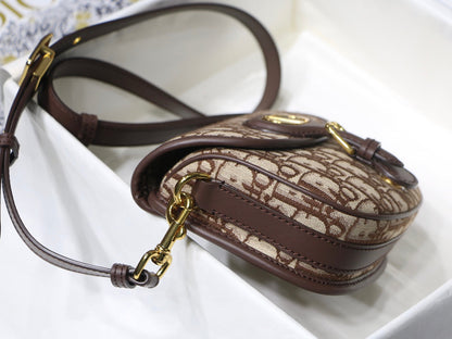MEDIUM CD BOBBY 22CM CHOCOLATE OBLIQUE CANVAS GOLD HARDWARE