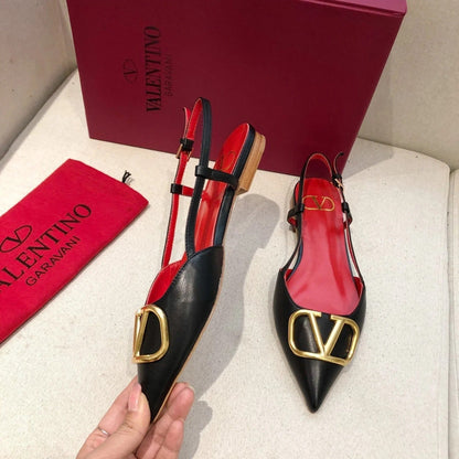 VLOGO SIGNATURE BLACK CALFSKIN FLAT SLINGBACK PUMP WITH GOLD LOGO