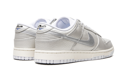 Dunk Low "Metallic Silver" DX3197 095